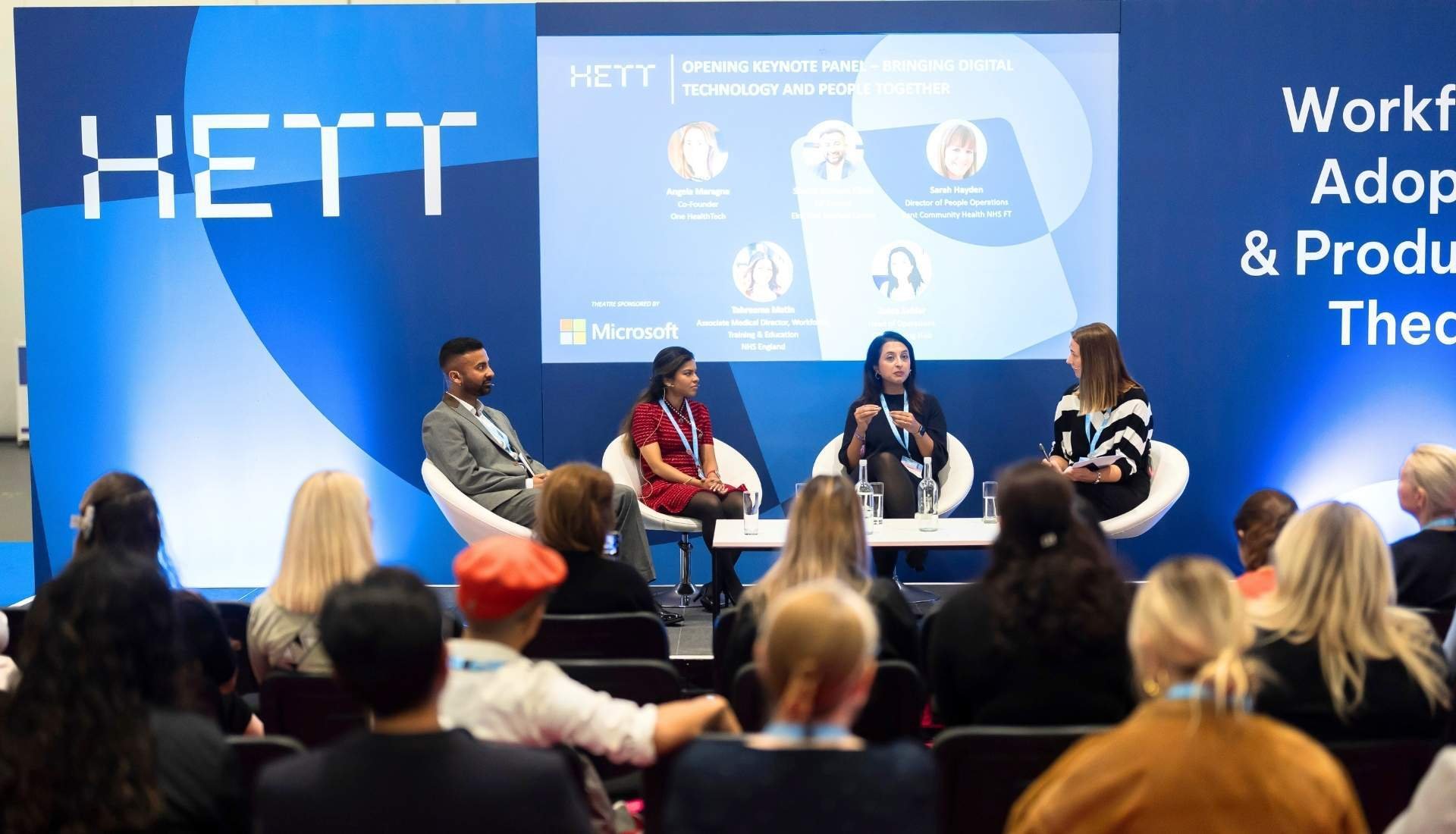 speakers on the stage at hett show